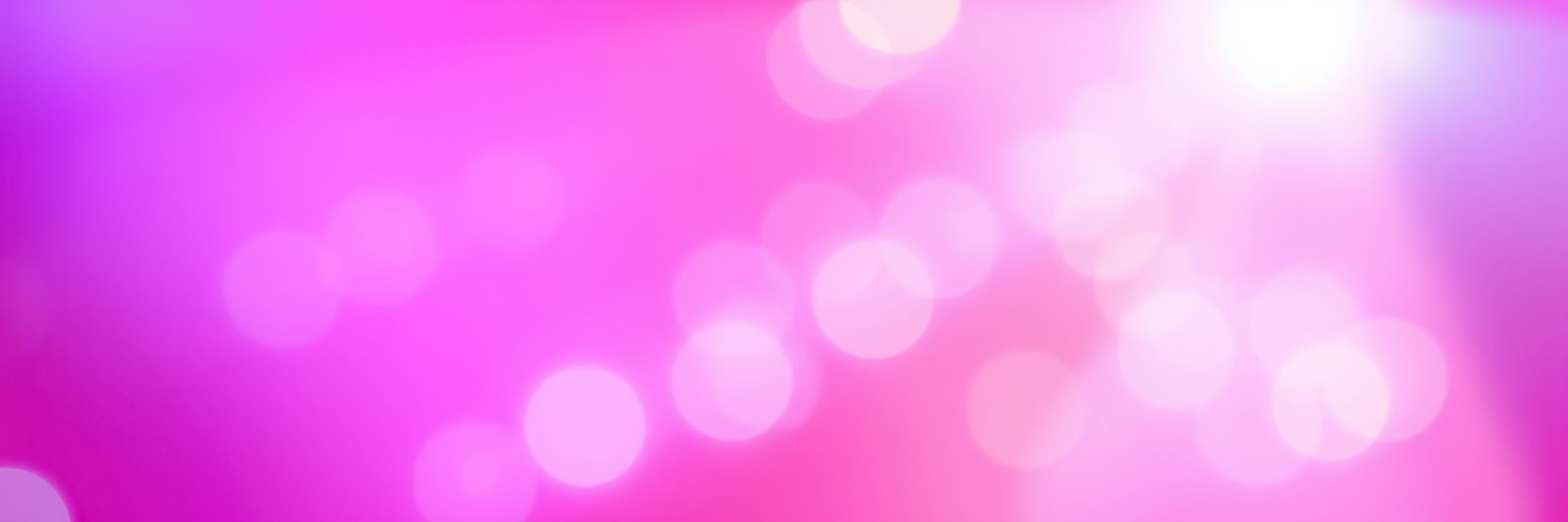 Colorful bokeh lights create a vibrant atmosphere in a lively event venue at night